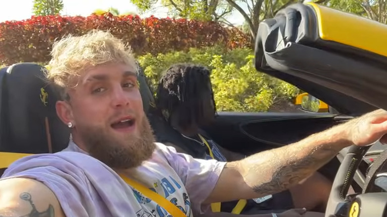 Jake Paul driving his Ferrari