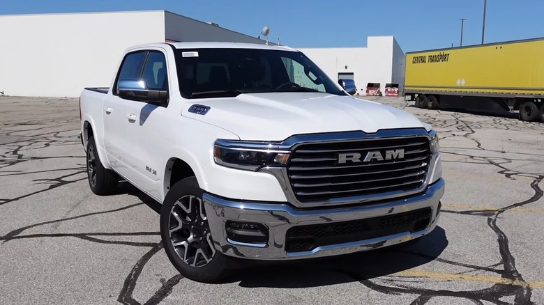 2025 RAM 1500 Laramie In White In A Parking Lot