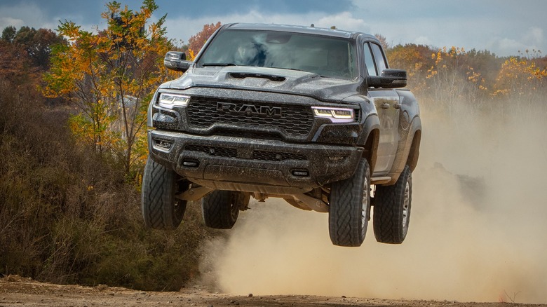 2025 RAM 1500 RHO In Black Airborne On Off-Road Trail