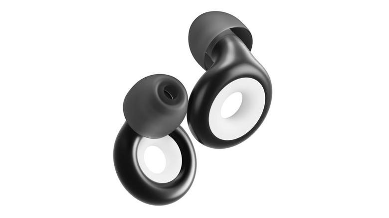 A pair of Loop Experience 2 Plug earplugs are positioned mid-air