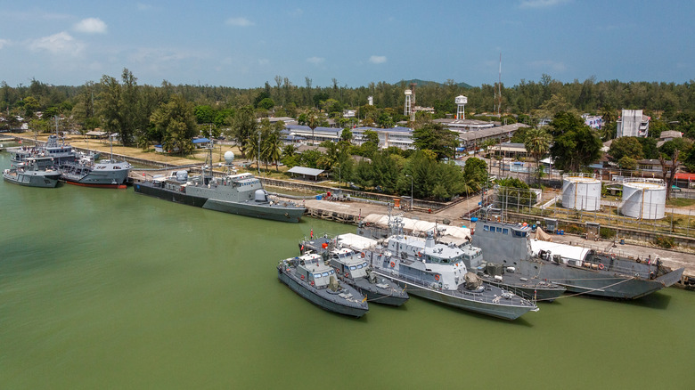 U.S. Navy ships sitting in a harbor