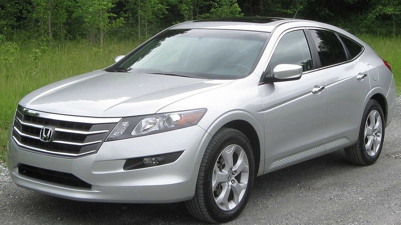 White Honda Crosstour parked on the road