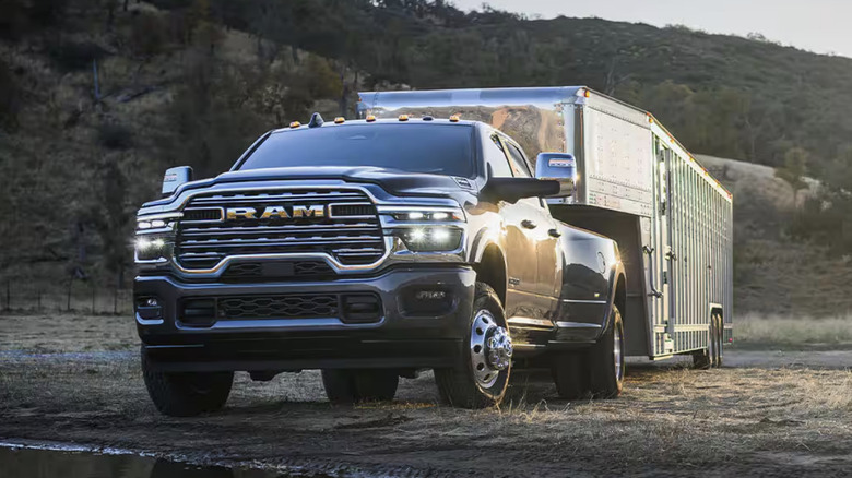 2025 Ram 3500 dually pulling a horse trailer