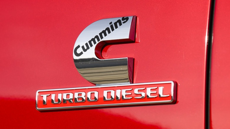 Close-up shot of a Cummins Turbo Diesel badge emblazoned on the 2025 Ram 2500 Heavy Duty Laramie