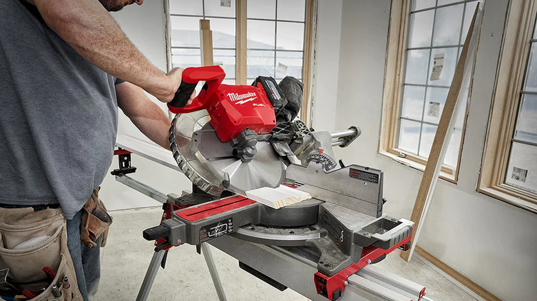 Man using Milwaukee miter saw