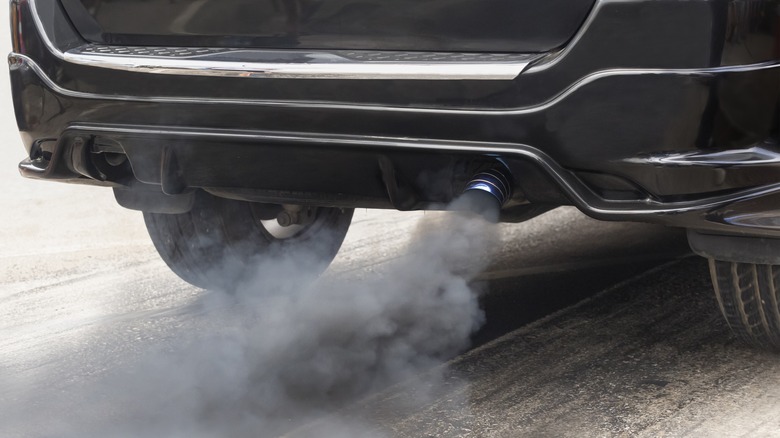 Car billowing black smoke