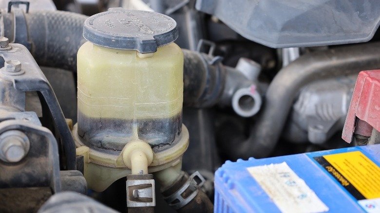 dirty power steering fluid