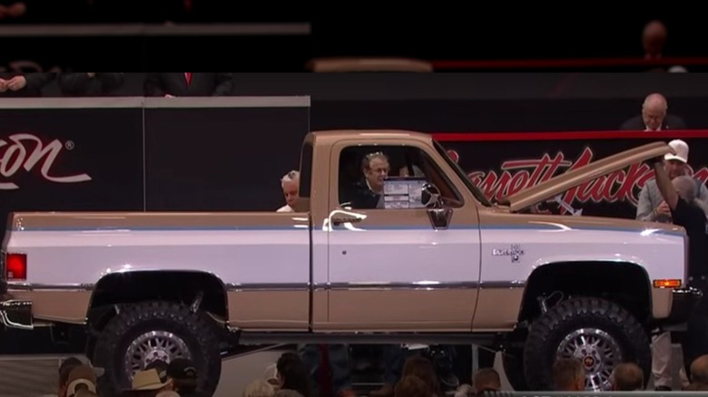 A two-tone Taupe and Cream 1984 Chevy K10 pickup at auction.