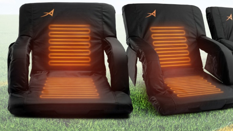 black and orange seats on grass