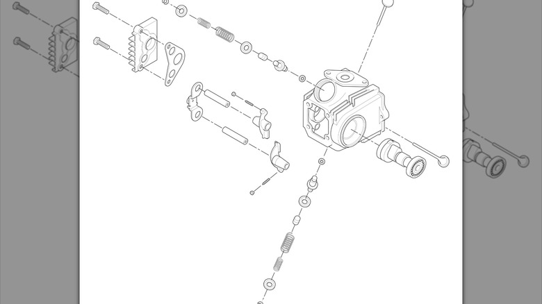 Exploded-view of an ATV cylinder head assembly.