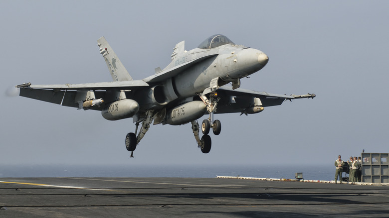 F/A-18 Hornet landing on aircraft carrier