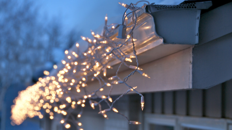 icicle lights in roof gutter