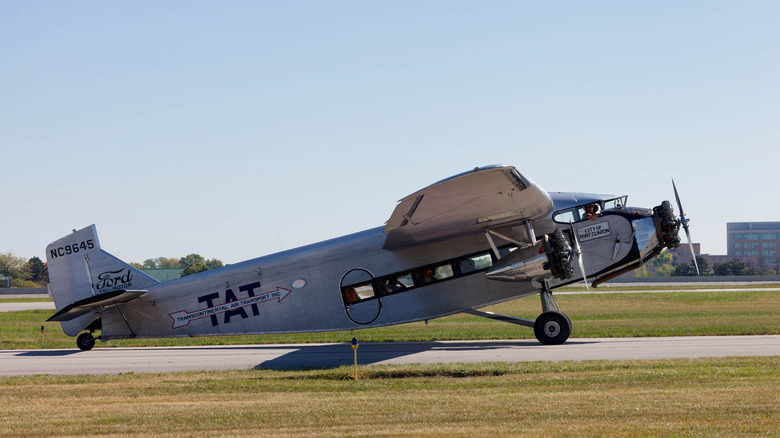 Ford Trimotor taking off at airport