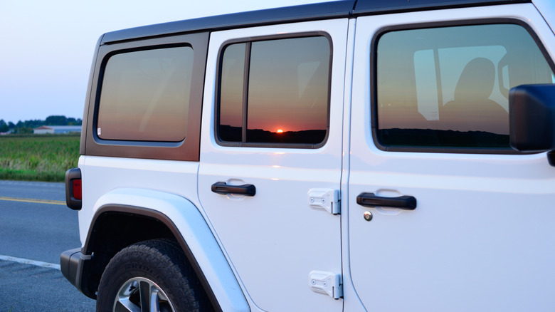 White Jeep with black hard top