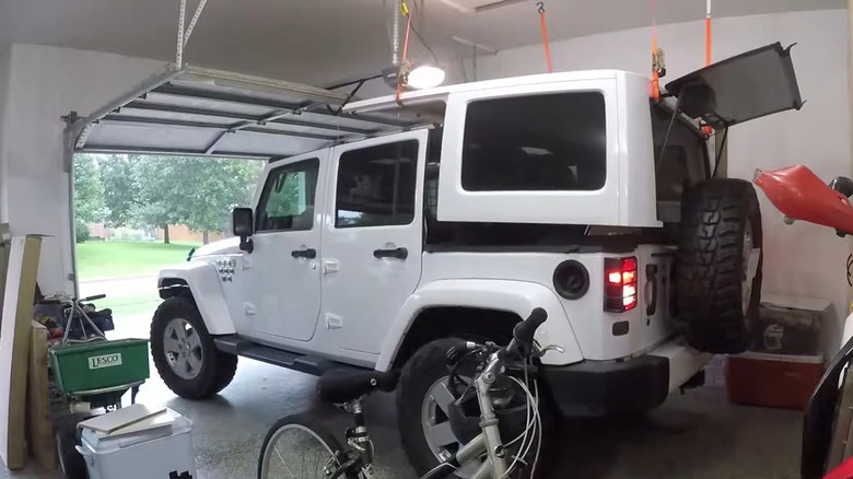 Jeep hard top hanging from ceiling