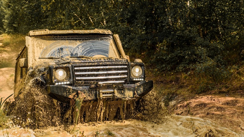 Off-road vehicle driving mud