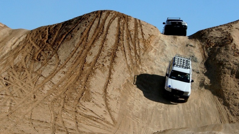 Off-road vehicle on sand dune