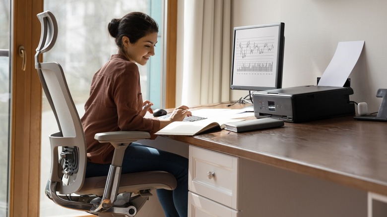 person sitting on office chair