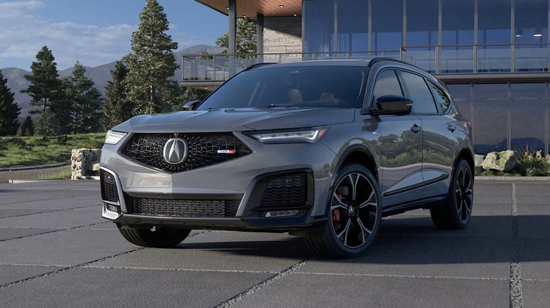 2025 Acura MDX Type S parked in front of a house