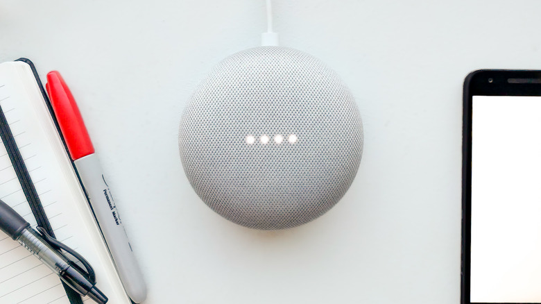 Google Nest Mini plugged in desk