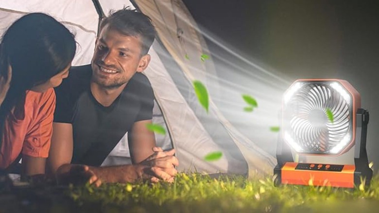 Man and woman with lantern fan 