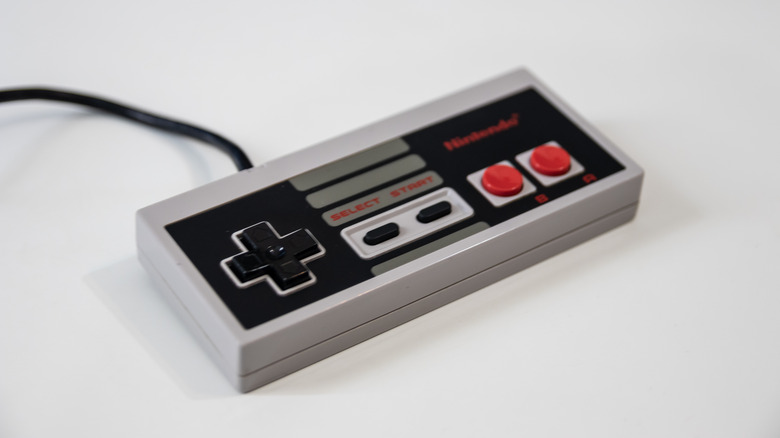 NES controller against grey background