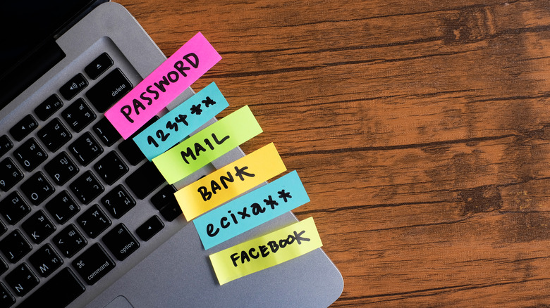 passwords on sticky notes on laptop