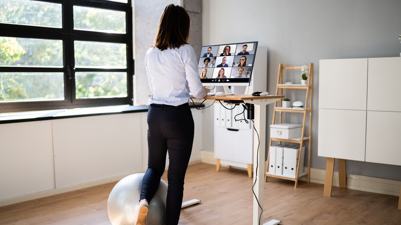 woman working at standing desk