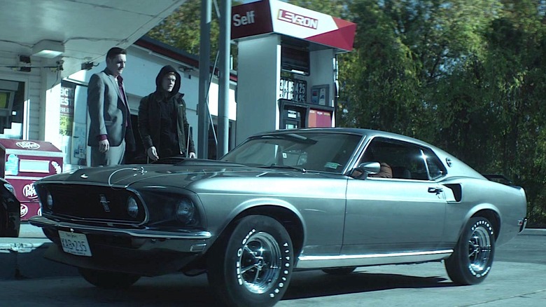 John Wick's Mustang parked at a gas station