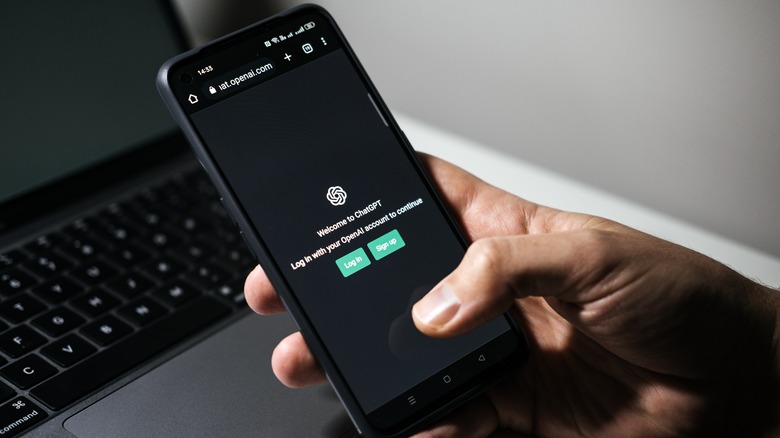 person on ChatGPT website on a smartphone