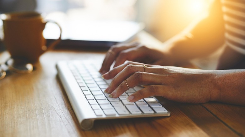 Woman using wireless keyboard