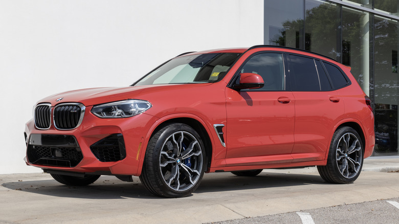 Red BMW i3 at dealership