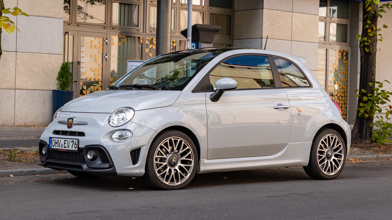 White Fiat 500 Abarth parked on street