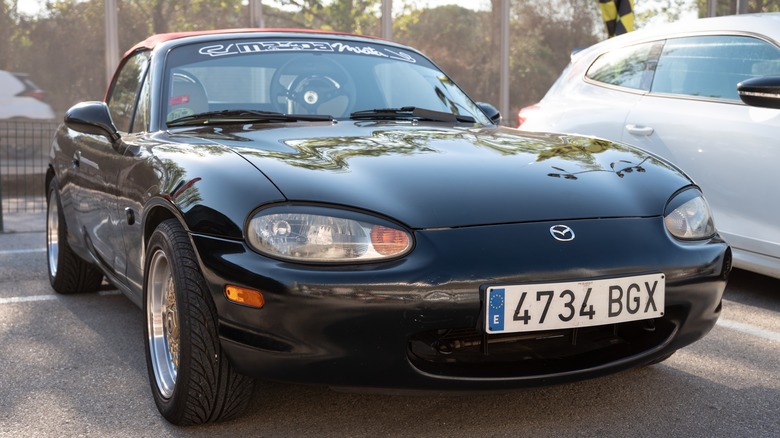 Miata NB in parking lot