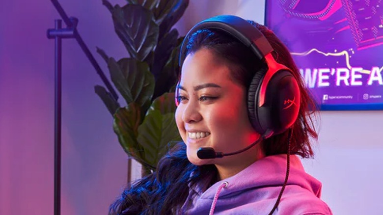 Woman wearing Hyperx Cloud 3s