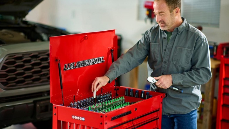 person with U.S. General tool cart