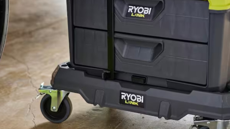 Close up of Ryobi dolly with tool box attached