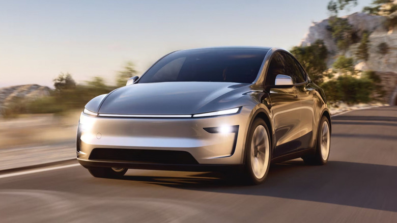 Front view of the Tesla Model Y driving on a road