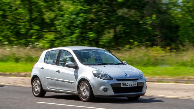 Renault Clio driving on winding road