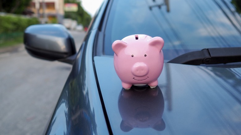 Piggy bank on a car