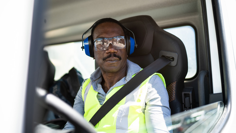 truck driver wearing ear protection