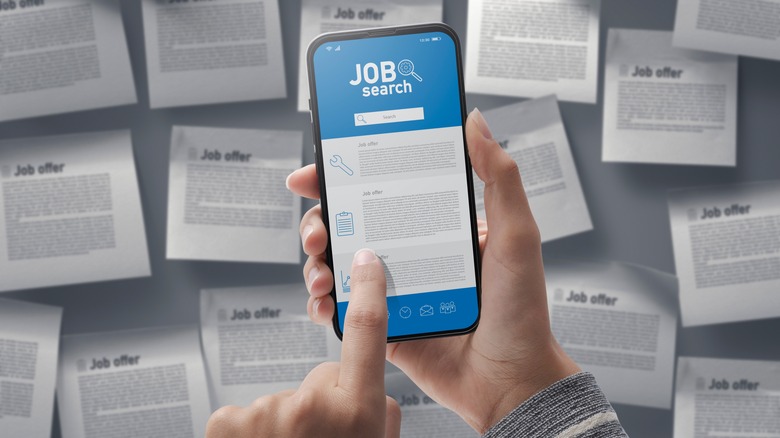 Person browsing job search app