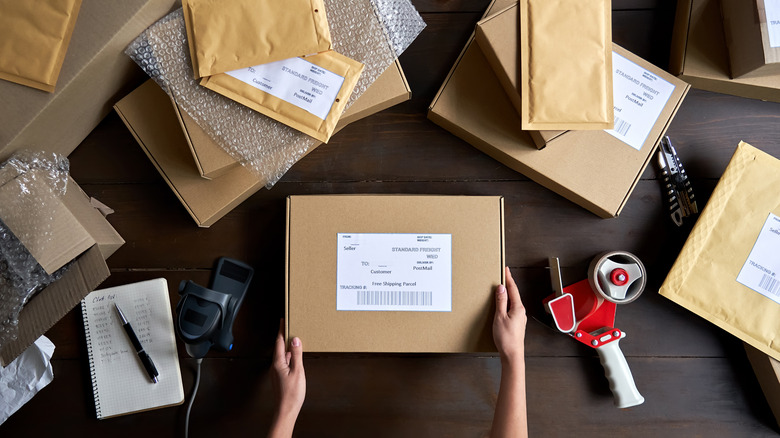 Person preparing to ship packages