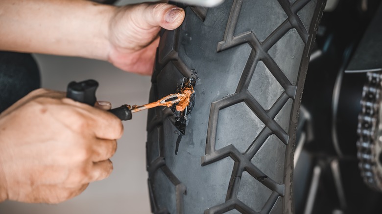 Repairing damaged motorcycle tire