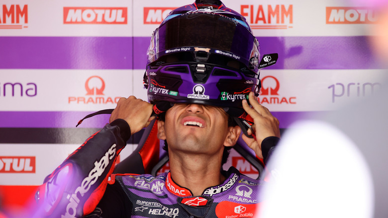 Jorge Martin from Spain of Prima Pramac Racing putting on his helmet