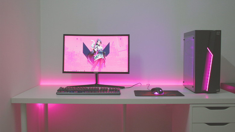 Gaming setup with pink lights