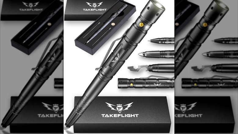 A black Takeflight tactical pen and its several heads