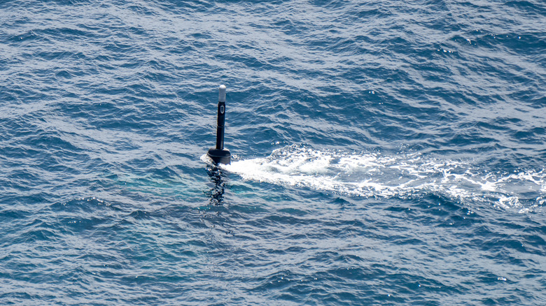 Submarine periscope sticking out of water