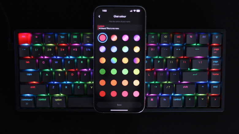 Keyboard with RGB lighting and a smartphone