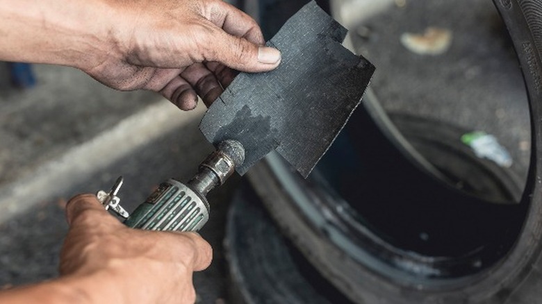 Person using die grinder